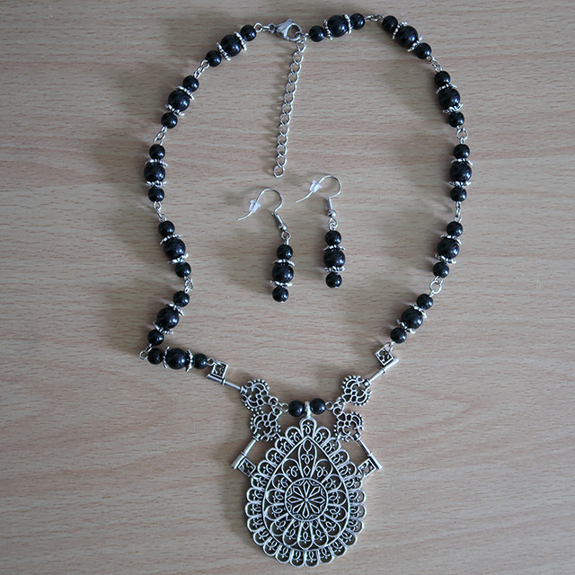 Cathedral Keys necklace and earrings (overhead view)