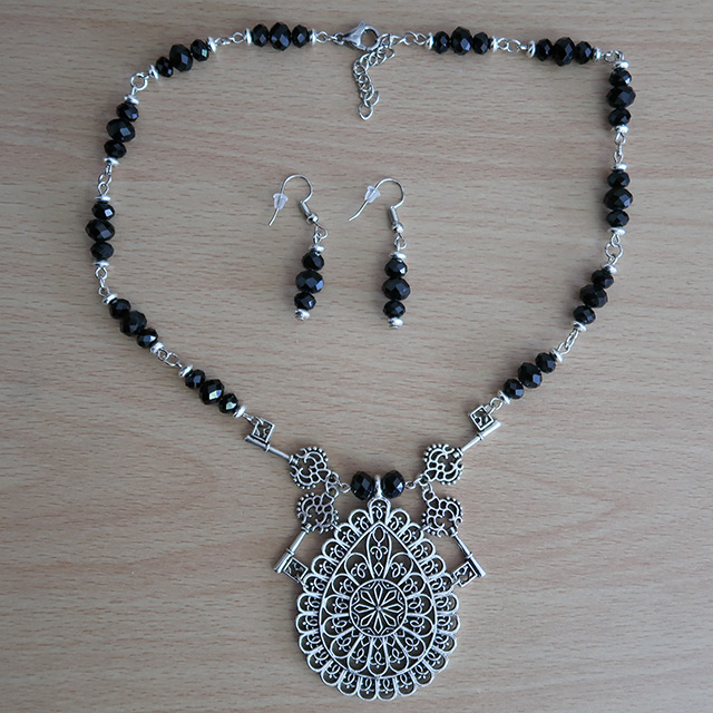 Cathedral Keys necklace and earrings (overhead view)